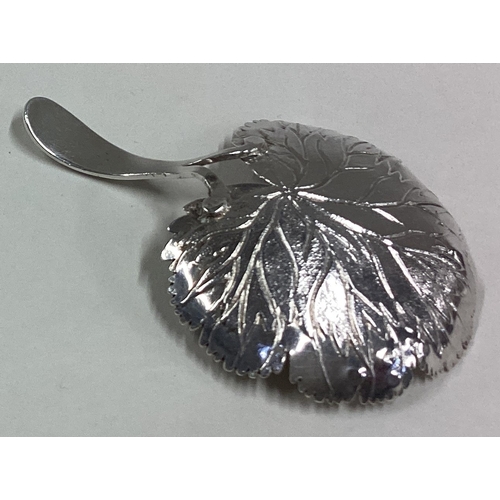 616 - A stylish silver caddy spoon of leaf form. Birmingham. Approx. 11 grams. Est. £50 - £80.