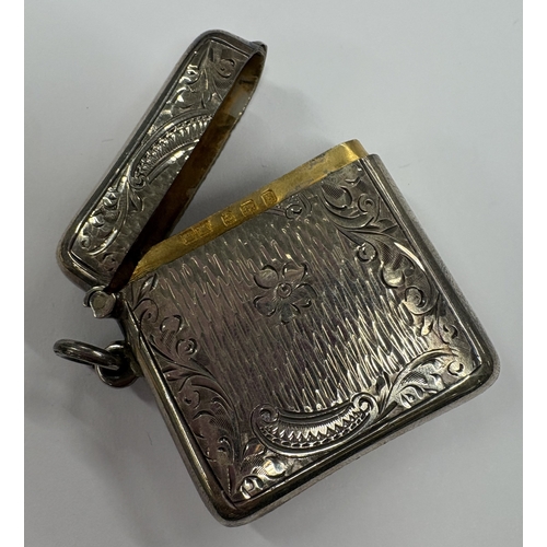 635 - A silver vesta case with finely engraved floral decoration. Birmingham 1906. By Henry Mathews. Appro... 