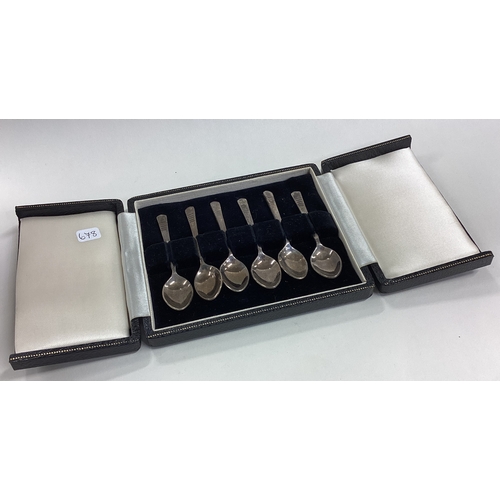 678 - A boxed set of six silver coffee spoons. Birmingham. Approx. 30 grams. Est. £30 - £40.