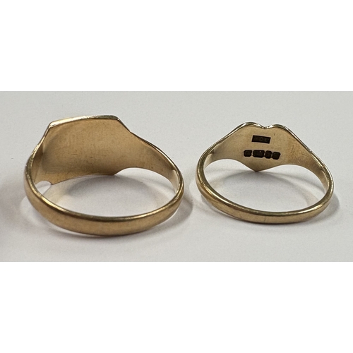 704 - Two 9 carat signet rings. Approx. ring sizes K and L. Approx. 4 grams. Est. £40 - £60.