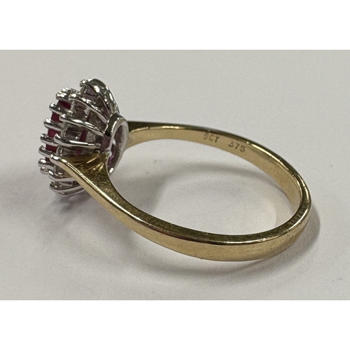 716 - A good diamond set cluster ring in 9 carat mount.  Approx. ring size M 1/2. Approx. 3 grams. Est. £6... 