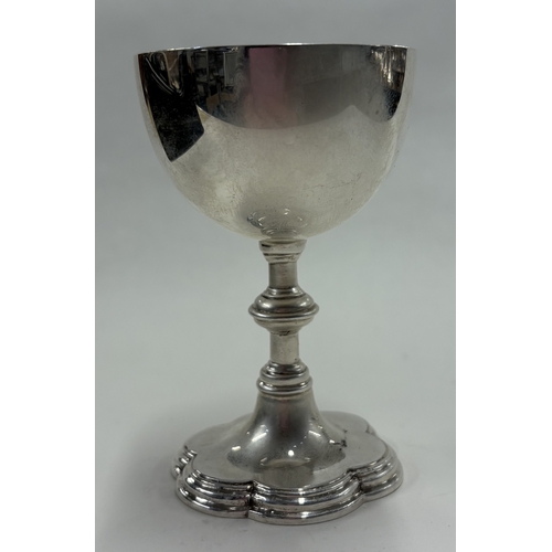 74 - A Victorian silver communion chalice with gilt interior. London 1885. By Wakely & Wheeler. Approx. 7... 