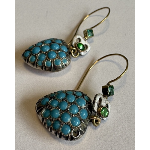 743 - A pair of silver and turquoise heart-shaped earrings with enamelled decoration. Approx. 6 grams. Est... 