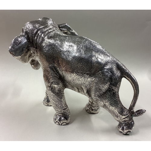 94 - A Naturalistic silver figure of an elephant. Sheffield 1998. Approx. 1274 grams of gross weight. Est... 