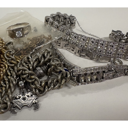 772 - A large group of silver and other costume jewellery. Est. £30 - £40.