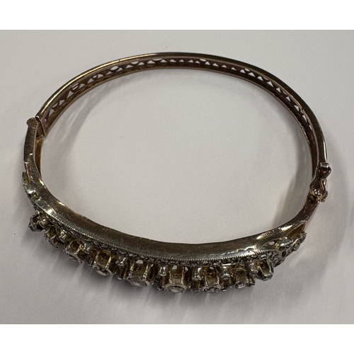 784 - An Antique gold mounted bracelet with claw decoration. Approx. 15 grams. Est. £300 - £400.