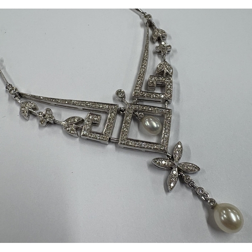 787 - An attractive pearl and diamond necklace with leaf decoration with concealed clasp. Approx. 17 grams... 