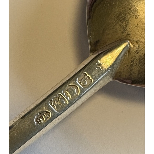 694 - A good silver seal top spoon in the Georgian style. London. By WC. Approx. 51 grams. Est. £40 - £60.