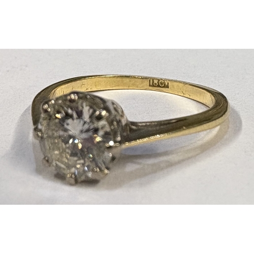 798 - A diamond single-stone ring set in 18 carat gold and platinum setting. Approx. ring size L. Approx. ... 