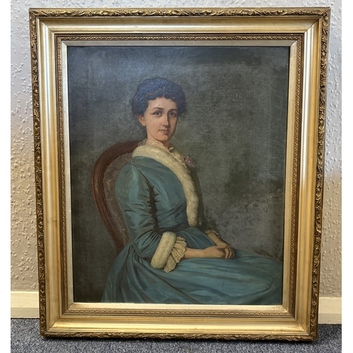 103 - A gilt framed oil on canvas depicting a portrait of a seated lady in blue dress. Approx. 50 cm x 60 ... 