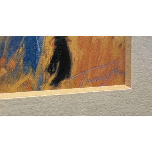 133 - A pair of framed and glazed Tony Hudson African prints. Approx. 20 cm x 14 cm (ss). £10 - £20.