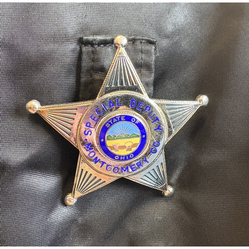 154 - A reproduction US Sheriff's Department uniform. Est. £10 - £20.
