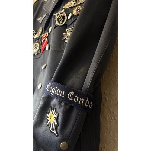 157 - A reproduction WW2 Luftwaffe Officer's uniform together with cap. Est. £20 - £30.