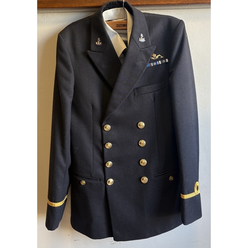 160 - A Royal Navy Officer's dress uniform together with cap. Est. £20 - £30.