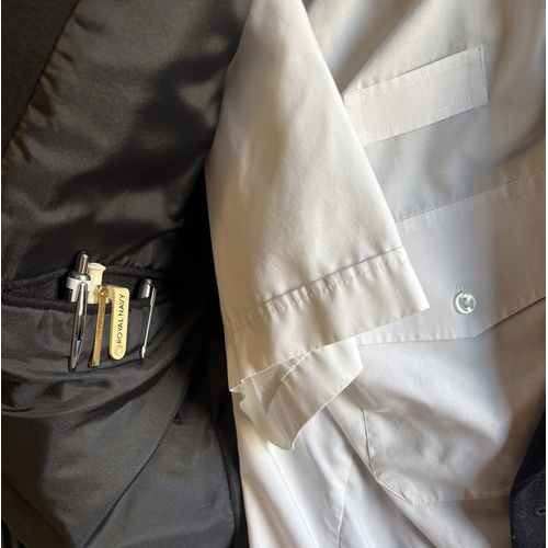 160 - A Royal Navy Officer's dress uniform together with cap. Est. £20 - £30.