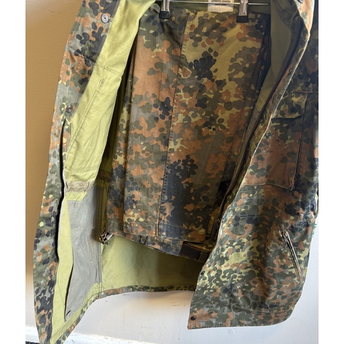 161 - A reproduction WW2 German M44 Pea Dot Tunic together with matching trousers. Est. £20 - £30.