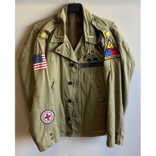 167 - A reproduction US Army battle dress jacket together with US Army shirt and trousers. Est. £10 - £20.