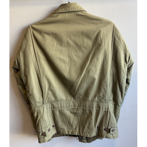 167 - A reproduction US Army battle dress jacket together with US Army shirt and trousers. Est. £10 - £20.