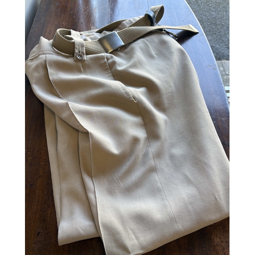 167 - A reproduction US Army battle dress jacket together with US Army shirt and trousers. Est. £10 - £20.