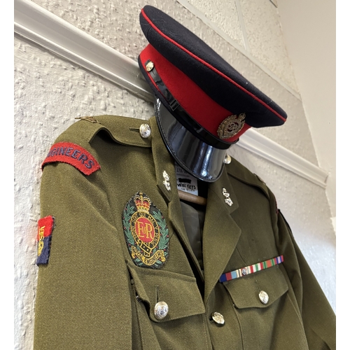169 - A Royal Engineers' No.2 dress jacket together with dress cap and staple belt. Est. £20 - £30.