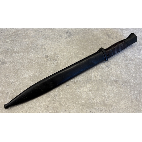 174 - A WW2 Nazi K98 bayonet with scabbard. Est. £30 - £40.