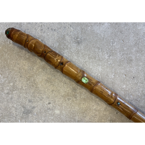 181 - A 20th Century bamboo sword stick with jewelled pommel. Est. £50 - £80.
