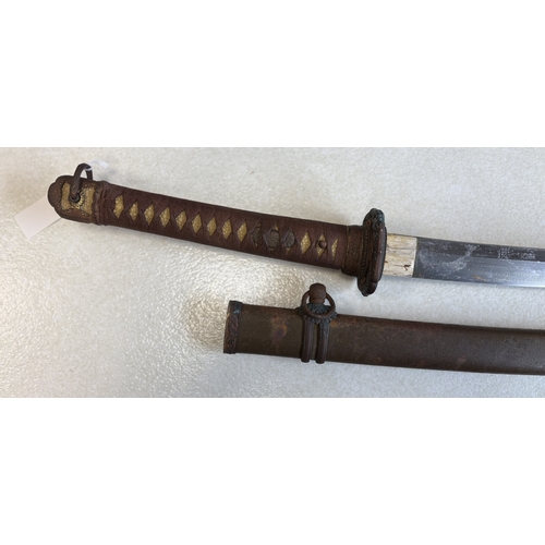 180 - A 20th Century Japanese katana. Est. £20 - £30.