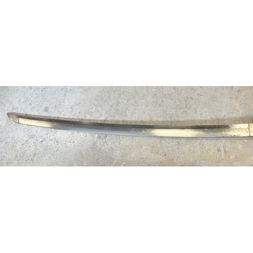 180 - A 20th Century Japanese katana. Est. £20 - £30.