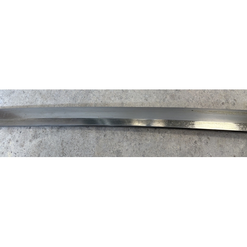 180 - A 20th Century Japanese katana. Est. £20 - £30.