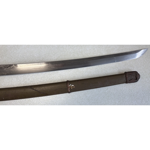 180 - A 20th Century Japanese katana. Est. £20 - £30.