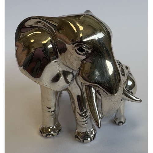 1 - A heavy cast silver figure of an elephant with calf. Marked 925 Standard. Approx. 82 grams. Est. £50... 