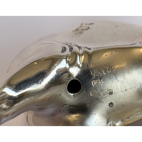 1 - A heavy cast silver figure of an elephant with calf. Marked 925 Standard. Approx. 82 grams. Est. £50... 