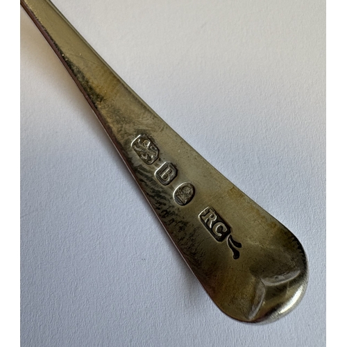 105 - A Georgian silver sifter spoon. London. By RC. Approx. 16 grams. Est. £20 - £30.