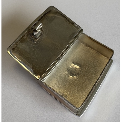 15 - A modern silver pill box in the form of a book with hinged cover. Approx. 13 grams. Est. £10 - £20.