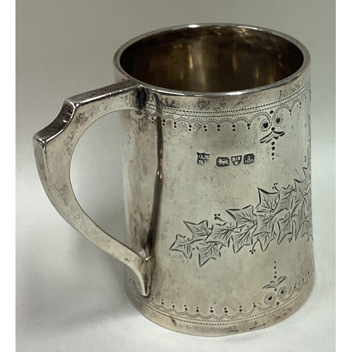 161 - CHESTER: A Victorian silver christening mug with engraved leaf decoration. Approx. 101 grams. Est. £... 