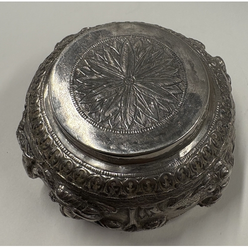 175 - A late 19th Century Burmese silver bowl three-dimensional decoration. Approx. 132 grams. Est. £120 -... 