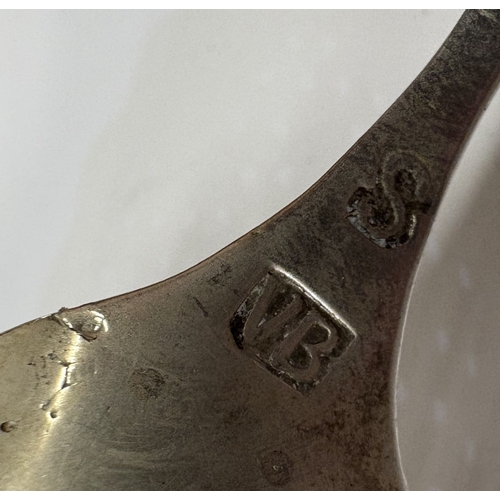 19 - An Antique Continental pierced silver caddy spoon with windmill decoration. Marked to bowl and handl... 