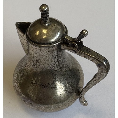 27 - A miniature heavy Continental silver baluster-shaped water jug. Approx. 47 grams. Est. £40 - £60.