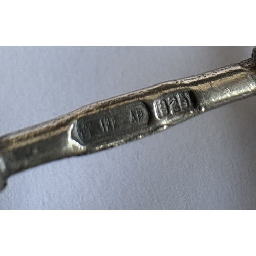 3 - A Continental silver model of a bicycle. Approx. 20 grams. Est. £20 - £30.