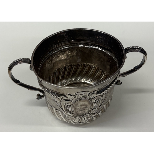 32 - A large Queen Anne Britannia Standard silver porringer. London 1707. By Robert Peake. Approx. 264 gr... 