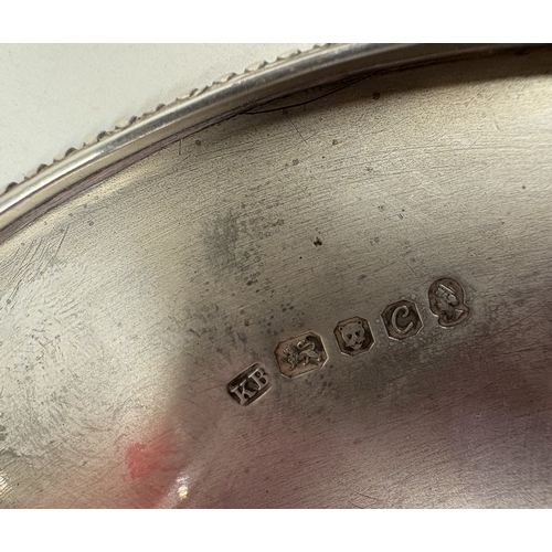 38 - A Modernistic silver tazza with unusual bright-cut decoration to top. London 1977. By Kenneth Bagule... 