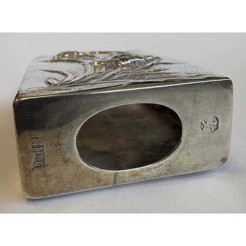 4 - A Chinese silver match case decorated with flowers. Approx. 37 grams. Est. £20 - £30.