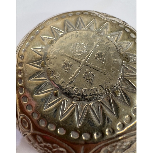 56 - A French silver wine taster with coin to centre. Marked to handle. Circa 1800. Approx. 28 grams. Est... 