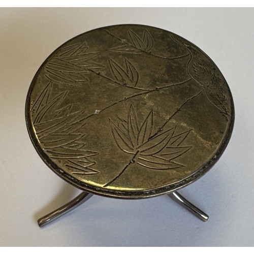 59 - A miniature Chinese silver table with bamboo decoration. Approx. 17 grams. Est. £20 - £30.