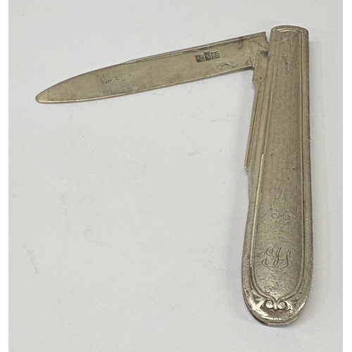 78 - An Indian Colonial silver travelling knife. Approx. 48 grams. Est. £40 - £60.