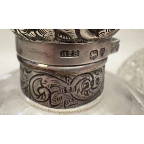 46 - A good pair of silver-mounted hobnail cut-glass scent bottles. Est. £50 - £80.
