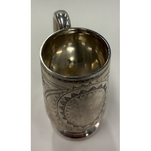 110 - A Victorian silver mug. Birmingham 1871. By Cohen Charles. Approx. 136 grams. Est. £350 - £400.