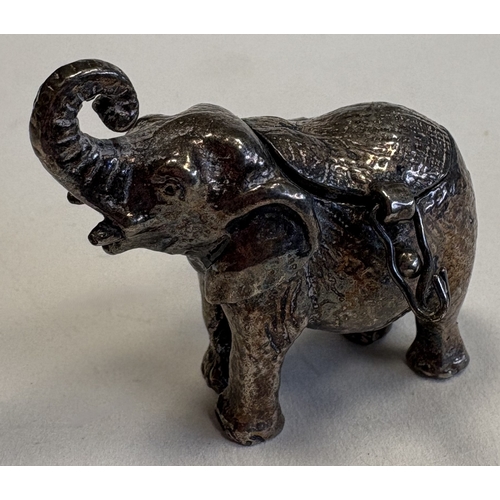 118 - A small silver pill box in the form of an elephant with hinged cover. Approx. 43 grams. Est. £60 - £... 