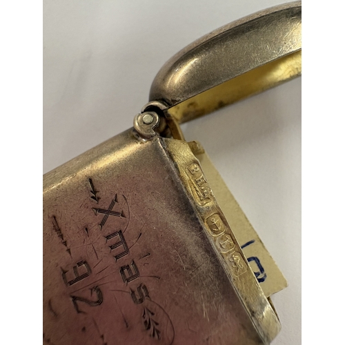 137 - A Victorian silver combination vesta and sovereign case. Birmingham 1892. Approx. 37 grams. Est. £15... 
