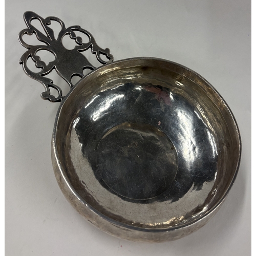 181 - A large and rare Queen Anne silver wine taster. London 1710. By Samuel Hawkes. Approx. 217 grams. Es... 